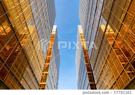 Golden building. Windows glass of modern office Golden building. Windows glass of modern office 57781161