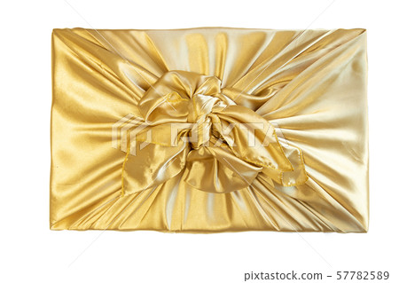 Gift box wrapped in golden crepe 57782589
