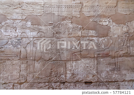 Hieroglyphs on wall of Karnak Temple Complex, famous architectural landmark in Luxor, Egypt. 57784121
