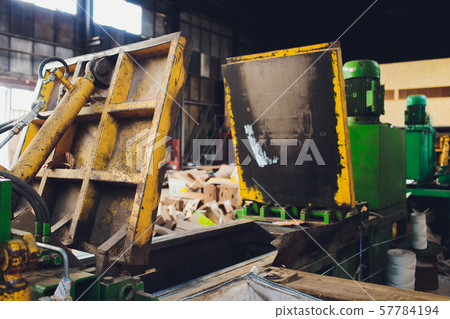 Special equipment for pressing paper waste at a waste sorting plant for further disposal or Special equipment for pressing paper waste at a waste sorting plant for further disposal or 57784194