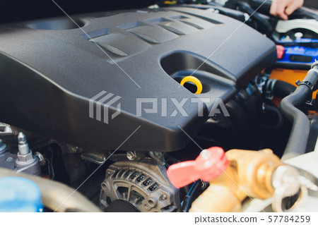 LPG , NGV Gas tanks are installed in a car for the 2 fuel system. 57784259
