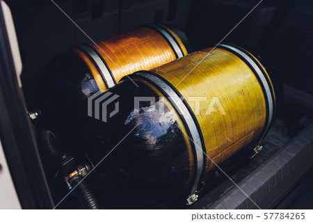 LPG , NGV Gas tanks are installed in a car for the 2 fuel system. LPG , NGV Gas tanks are installed in a car for the 2 fuel system. 57784265