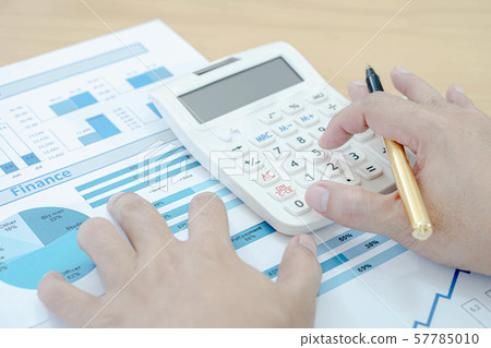Close up businessman working and writing on Close up businessman working and writing on 57785010