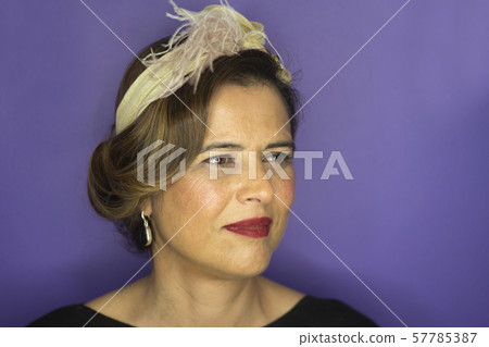 Portrait of mature woman combed and made up style 57785387