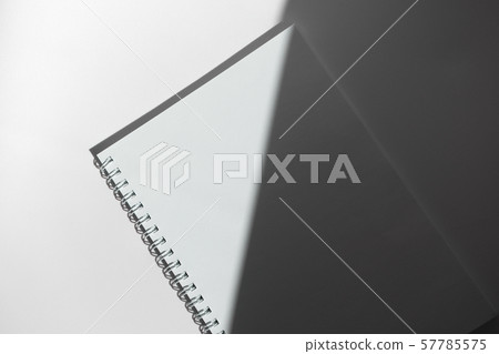White empty paper notebook with spiral on white 57785575