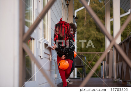 Two Kids Playing Games on Halloween Two Kids Playing Games on Halloween 57785803
