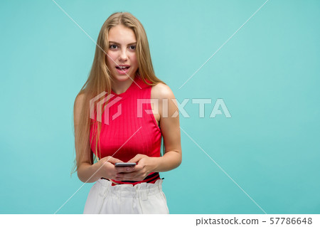 Overjoyed happy excited female glad to recieve 57786648