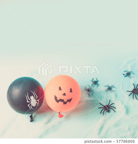 Halloween scene with balloons 57786808