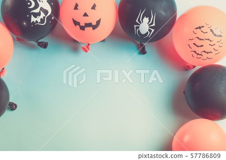 Halloween scene with balloons 57786809