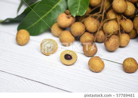 Longan fresh tropical fruit and green leaf in 57789481