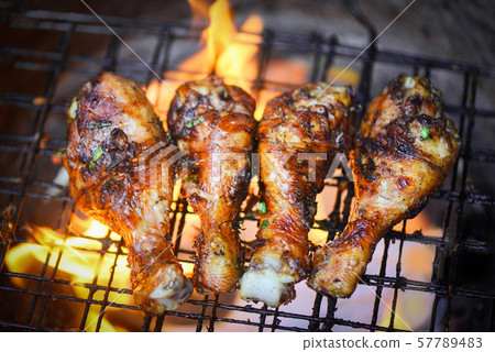 Grilled chicken legs barbecue with herbs and Grilled chicken legs barbecue with herbs and 57789483