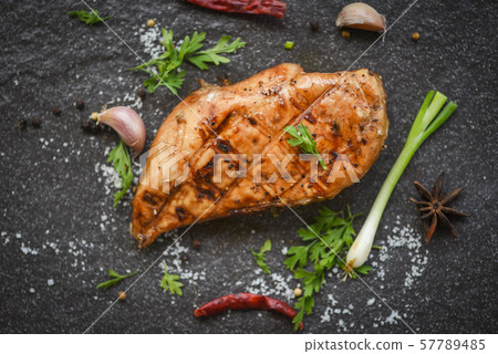 Grilled chicken breast or fillet with garlic 57789485