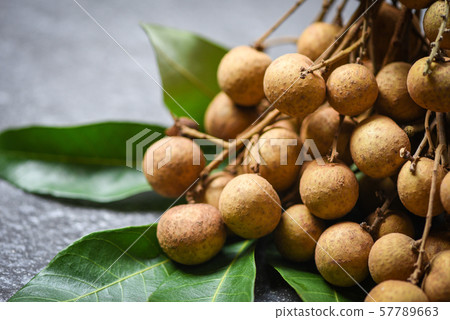 Longan fresh tropical fruit and green leaf in Longan fresh tropical fruit and green leaf in 57789663