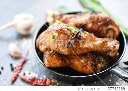 Grilled chicken legs barbecue with herbs and Grilled chicken legs barbecue with herbs and 57789669