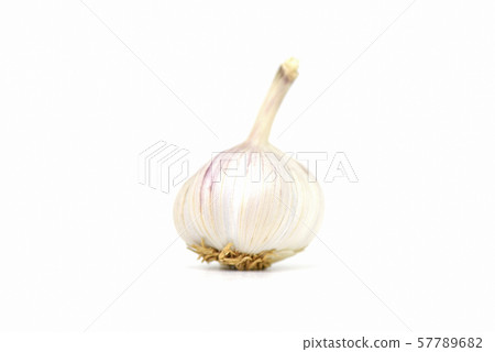 Garlic Isolated - Close up raw garlic on white Garlic Isolated - Close up raw garlic on white 57789682