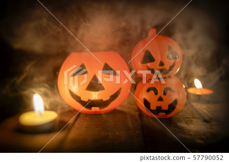 Halloween pumpkin lantern candle light on wooden 57790052
