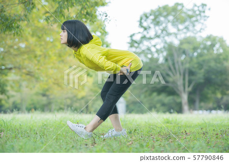 Women exercising in the park Women exercising in the park 57790846