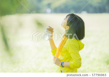 Women exercising in the park 57790863