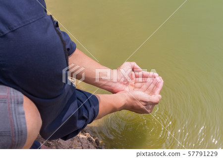 water hands with drought 57791229
