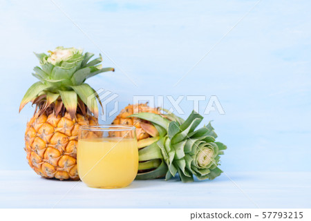 Pineapple juice in glass and ripe pineapple fruit Pineapple juice in glass and ripe pineapple fruit 57793215