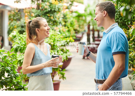 Talking young man and woman Talking young man and woman 57794466
