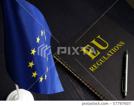 EU regulations and Europe Union flag. 57797607