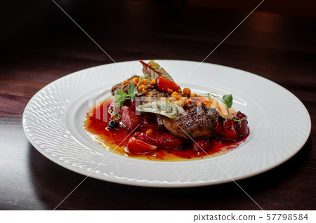 Delicious lunch of pork meat and vegetables Delicious lunch of pork meat and vegetables 57798584