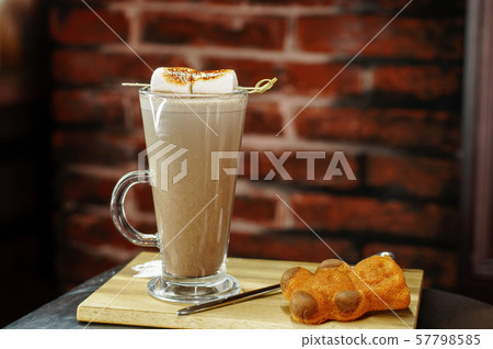 Delicious coffee with marshmallows and sweet bear 57798585