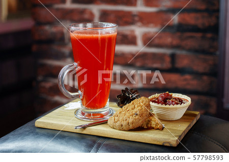 Delicious drink in a mug with cookies Delicious drink in a mug with cookies 57798593