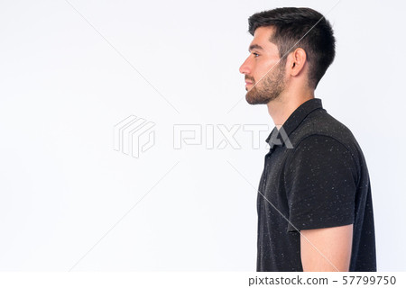 Closeup profile view of young bearded Persian man Closeup profile view of young bearded Persian man 57799750