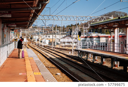 Alone Japanese passenger at  Kakunodate JR train 57799875