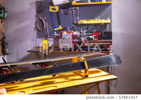 Ski service repairing the ski and bicycle Ski service repairing the ski and bicycle 57801457