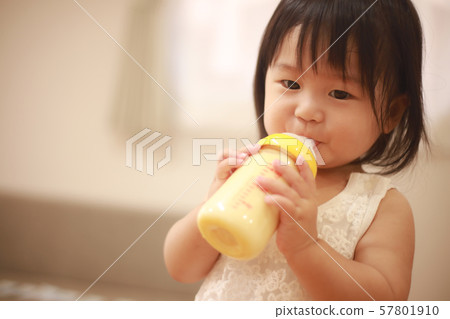 Baby drinking milk Baby drinking milk 57801910