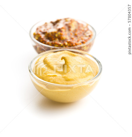 Yellow mustard and whole grain mustard. 57804357