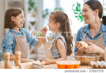 family are preparing bakery together family are preparing bakery together 57807578
