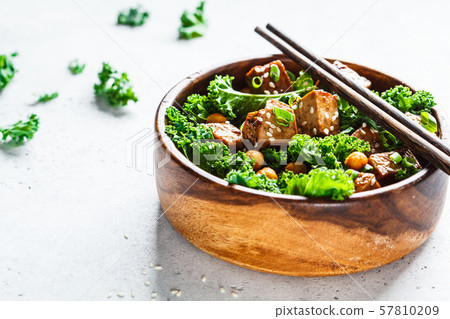 Teriyaki tofu salad with kale and chickpeas 57810209