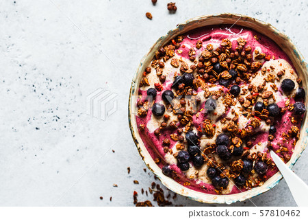 Berry smoothie bowl with peanut butter Berry smoothie bowl with peanut butter 57810462