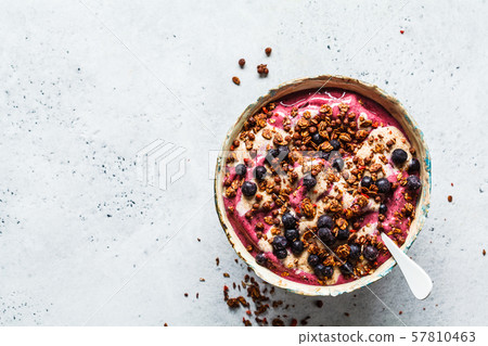 Berry smoothie bowl with peanut butter Berry smoothie bowl with peanut butter 57810463