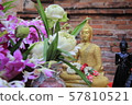 Buddha statue fowers lotus  57810521