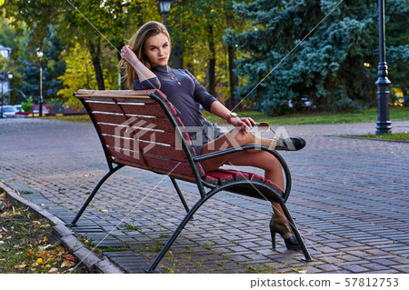 A young woman with long hair in a turtleneck 57812753