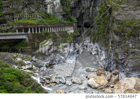 Dark river in taroko national park after rain 57814847