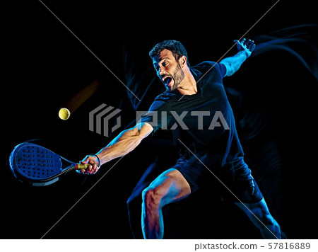 Paddle tennis player man light painting isolated black background 57816889