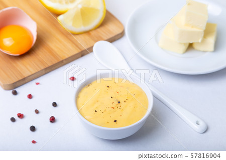 Homemade Hollandaise Sauce. Classic traditional sauce based on eggs. Homemade Hollandaise Sauce. Classic traditional sauce based on eggs. 57816904