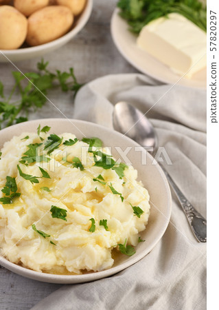 Mashed potatoes with butter 57820297