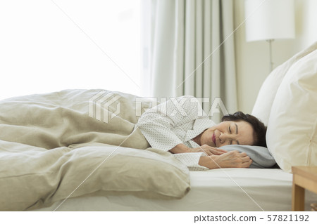 Senior woman sleeping Senior woman sleeping 57821192