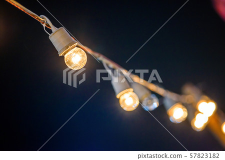 string wired with warming light Bulbs hanging in string wired with warming light Bulbs hanging in 57823182