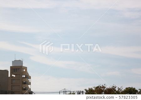 High autumn sky overlapping streaks clouds 57823305