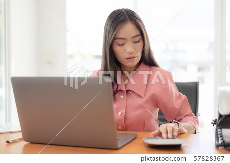 Young asian businesswoman checking the time, work Young asian businesswoman checking the time, work 57828367