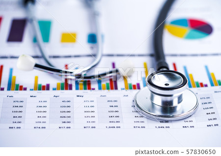 Stethoscope, Charts and Graphs spreadsheet paper, Finance, Account, Statistics, Investment, Analytic research data economy spreadsheet and Business company concept.. 57830650