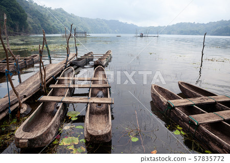 Scenic view of traditional fisher boats on Danau Scenic view of traditional fisher boats on Danau 57835772